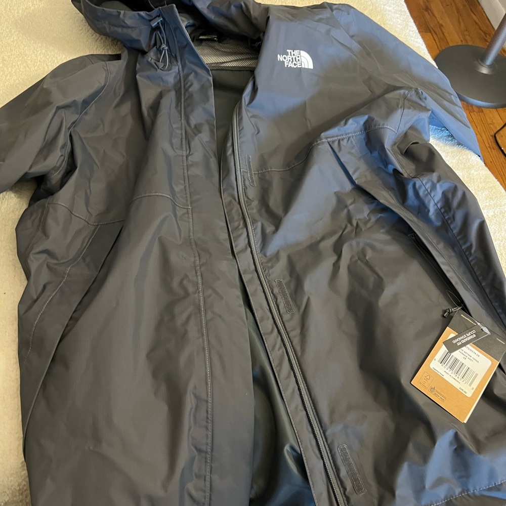 Northface raincoat. Never been worn.